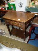 A Priory Oak style Credence style Side Table having a frieze drawer,