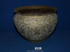 A large brass Planter with ornate floral decoration with figures, 8 1/2'' tall x 10 1/2'' diameter.
