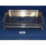 A plated galleried Tray, standing on four claw feet, 11 1/2'' x 8 1/2''.