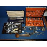 A boxed carving set, six setting cutlery set and miscellaneous flatware.