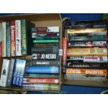 Two boxes of books to include; John Grisham, James Patterson, Wilbur Smith, David Baldacci, etc.