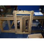 Four large decorative picture frames; the apertures suitable for pictures 28 3/4" x 21 1/2",