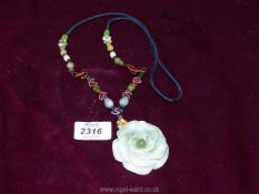 A Lotus Jade Necklace.