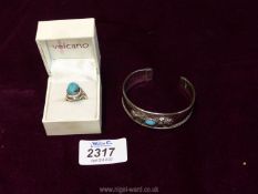 An Art Nouveau style silver ring with turquoise stone stamped 925,