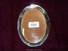 A silver and wooden photograph frame, hallmarks for Birmingham, dated 1919,makers W.S Myatt & Co.