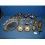 A quantity of mixed metals, white metal tray, candlesticks, horse brasses, jug and saucer, bowl,