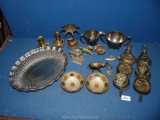 A quantity of mixed metals, white metal tray, candlesticks, horse brasses, jug and saucer, bowl,