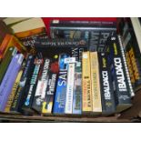 A box of books to include; Chris Ryan, David Baldaci, Peter James, etc.