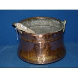 A copper bucket with brass handle, 12" x 11" x 8 1/2" tall.