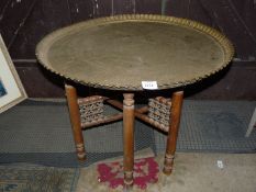 A Benares table and stand.