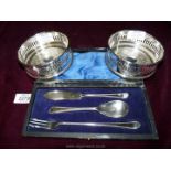 A pair of Arthur Price bottle coasters, 4 1/2" diameter, plus a boxed set of EPNS - pickle fork,
