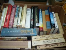 A box of books to include; C.J.