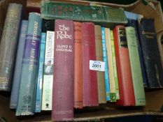 A box of hardback books to include; 'Doomsday Morning' by Winwood Reld, 'The Robe' by Lloyd C.