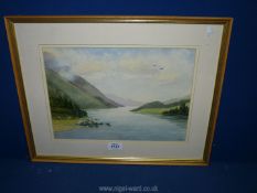 A framed and mounted Watercolour 'In The Mawdach Estuary', initialled lower right E.M.