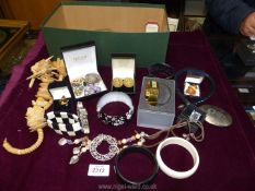 A box of fashion/costume jewellery with some boxed items including DKNY watch,