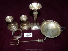 A small silver vase (Sheffield 1915 by James Deakin & Sons) and a silver ashtray and pickle fork