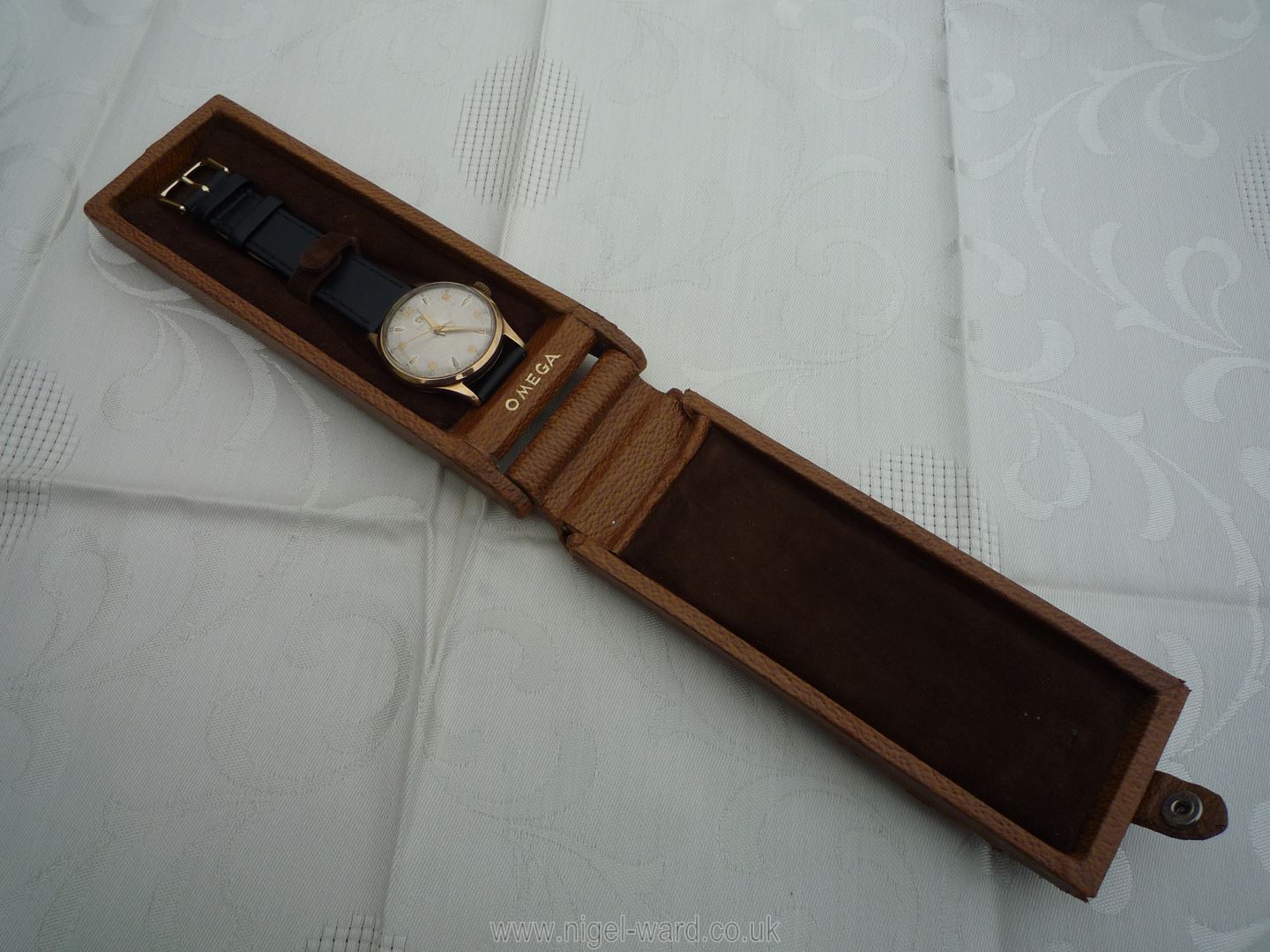 A brown leather presentation cased ''Omega'' Wristwatch having a nickel coloured face with Arabic - Image 20 of 23