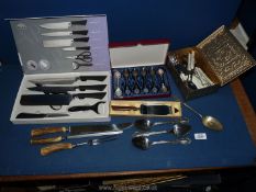 A quantity of boxed and loose cutlery including six piece knife set , display teaspoons,