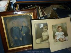 A wooden framed Print from a black and white photograph of a couple,