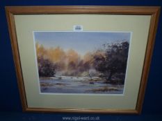 A framed and mounted Watercolour depicting a winter landscape with sheep grazing,