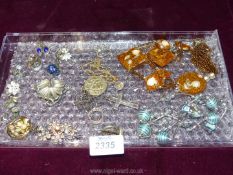 A box of miscellaneous jewellery to include; necklaces, rings, pendants, brooches, clip on earrings,