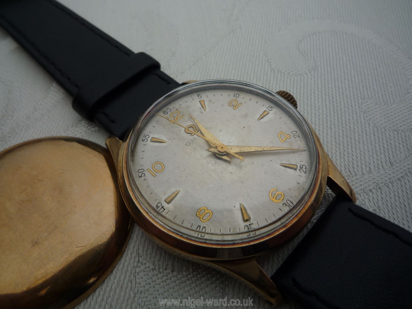 A brown leather presentation cased ''Omega'' Wristwatch having a nickel coloured face with Arabic - Image 11 of 23