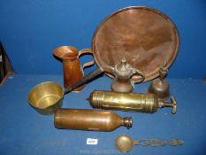 A quantity of copper and brass including jug, flask, bell, old fire extinguisher, charger etc.