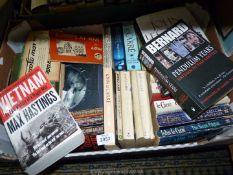A box of novels to include; John LeCarre, 'Europe at War' by Low, 'Vietnam' by Max Hastings, etc.
