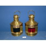 A pair of reproduction 'Port and Star Board' brass lanterns.