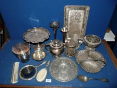 A quantity of EPNS including a vanity set, shell dish, bud vases, cake stand,