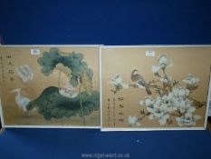 A pair of fabric painted oriental pictures depicting a stork and a bird.