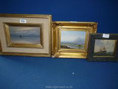 An Oil on board depicting figures by a loch with mountains in the distance,