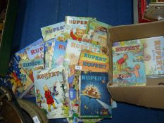 A large quantity of Rupert The Bear annuals.