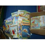 A large quantity of Rupert The Bear annuals.