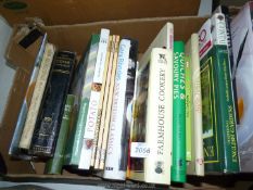 A box of cookery books.