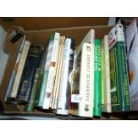 A box of cookery books.