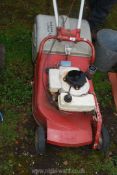 A lawn mower with roller and grass box, has been running but fuel system/carburettor blocked.