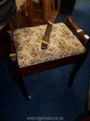 A tapestry topped piano stool a/f.