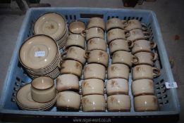 A quantity of Denby 'Memories' cups and saucers