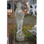 A concrete Flower lady garden statue (damaged) 31" high.