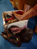 A quantity of handbags, scarves etc.