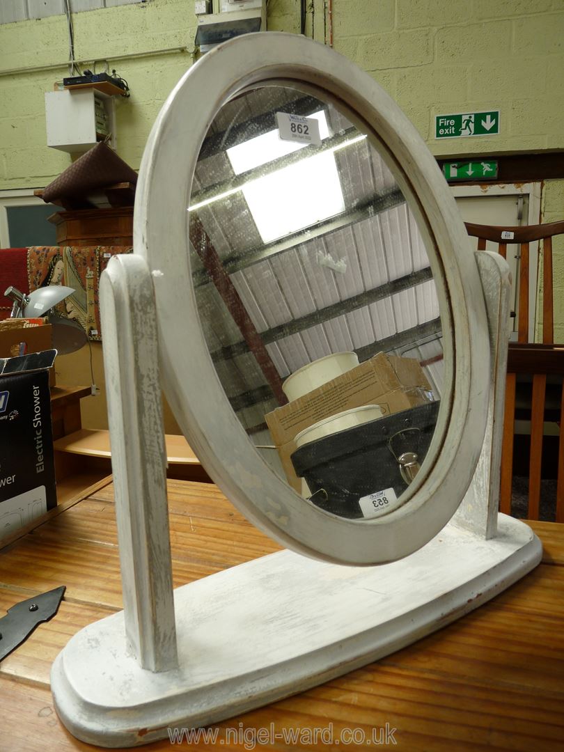 A white painted frame swing mirror.