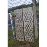 A pair of cast iron diamond panel windows, (bottom opening), 55" high.