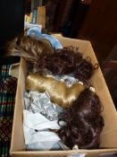 A box of hair pieces.