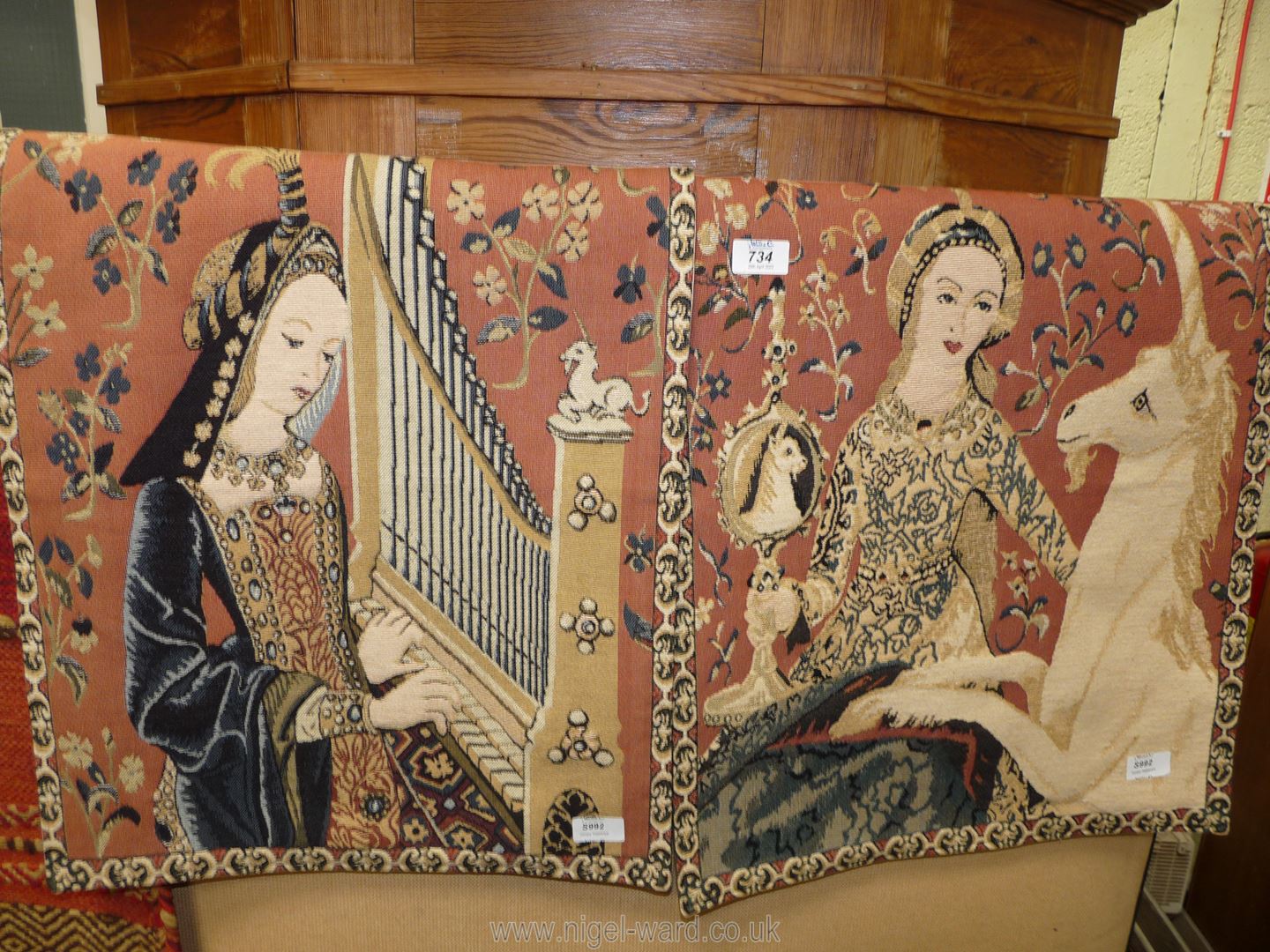A pair of modern tapestry wall hangings