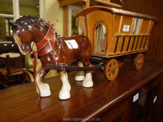 A Gypsy caravan with china horse