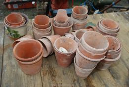 A large quantity of old Terracotta pots in a sack,