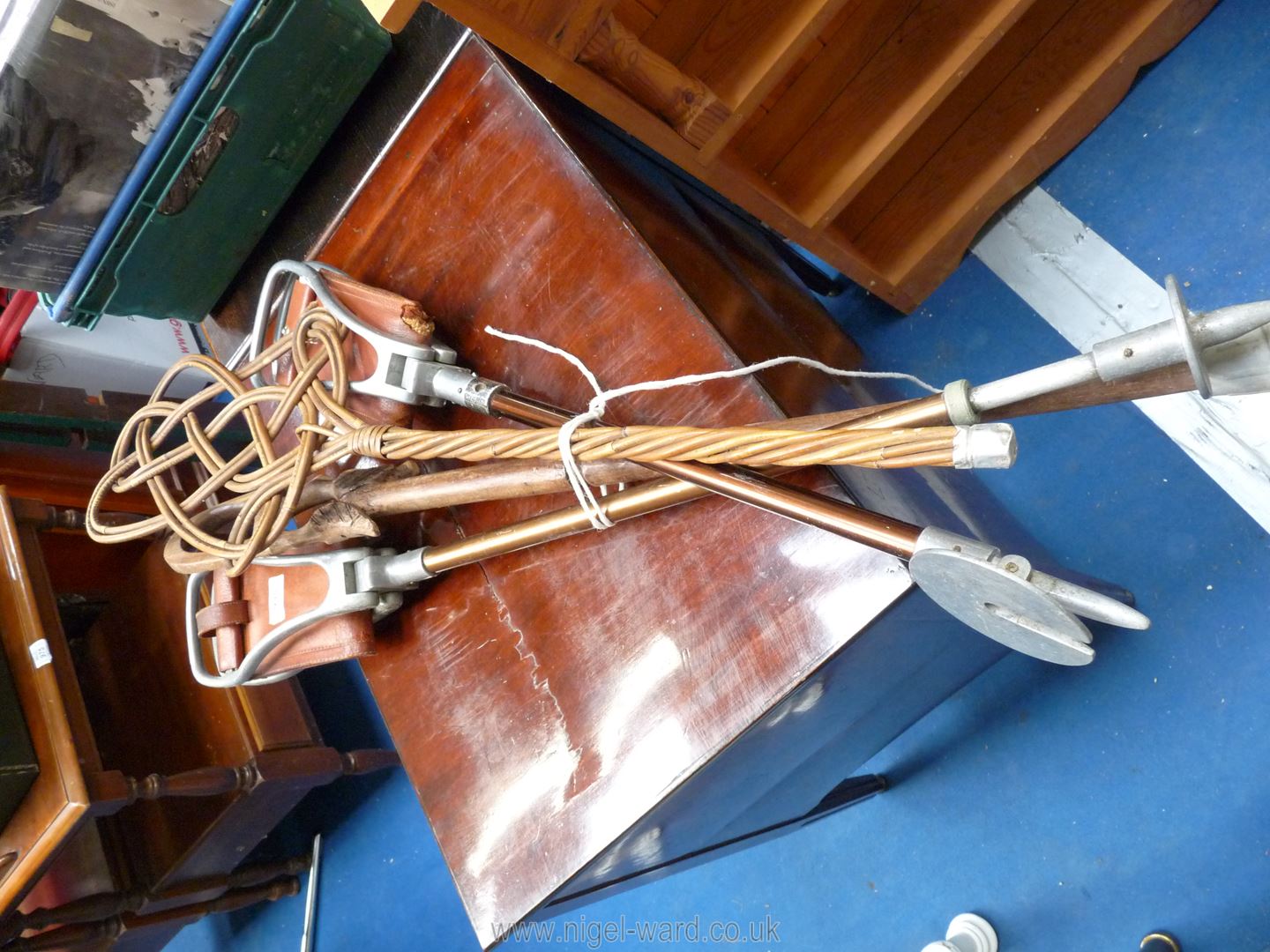 Two shooting sticks, carpet beater etc.