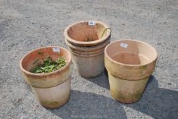 Four terracotta pots, 9" and 10".