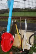 A roll of polythene, sledge hammer, hoe, toboggan etc.